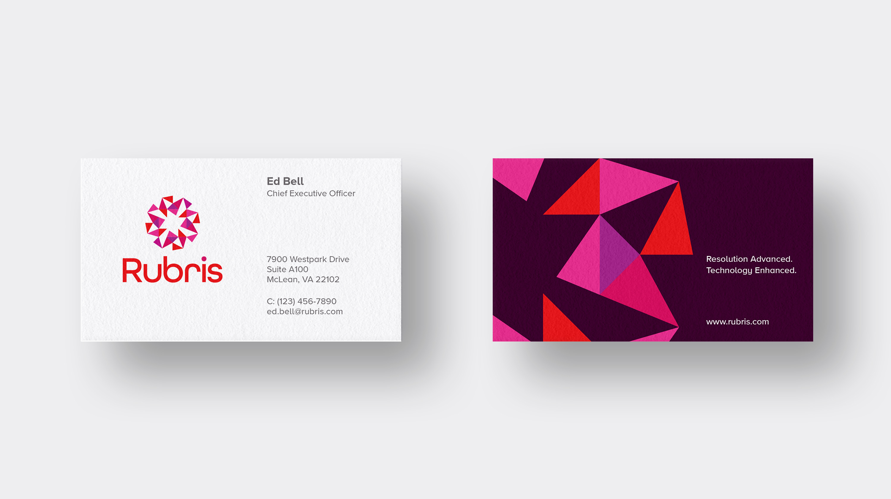 gem-like logo on business card